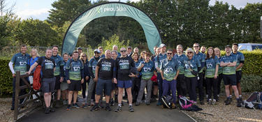 Group of charity walkers at the start line of the Prologis 100 